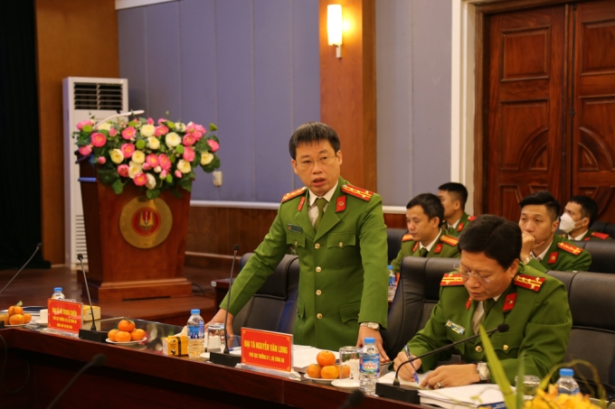 Đại tá Nguyễn Văn Long - Phó Cục trưởng Cục Cảnh sát quản lý tạm giữ, tạm giam và thi hành án hình sự tại cộng đồng tham luận tại Hội thảo